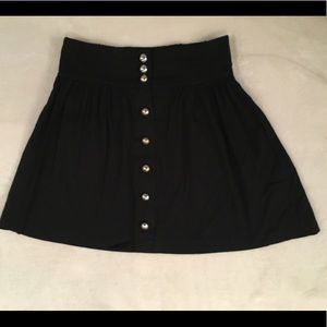 Cute black skirt w/ gold buttons and elastic waist